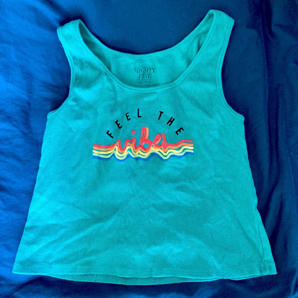 A large turquoise crop top from Mighty Fine!